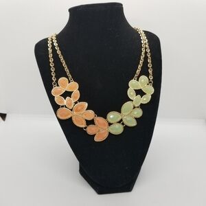 Charming Charlie statement necklace light orange and green